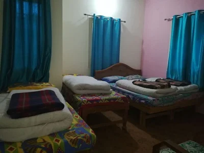 Bedding and facilities at Bikaner House